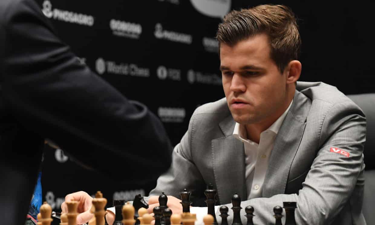  Magnus Carlsen survived a tough challenge in Game 8 of the world chess championship to save a draw. Photograph: Facundo Arrizabalaga/EPA